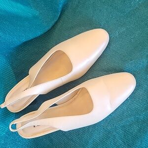 Ivory Heeled Side on Mules sz, 9.5 WW